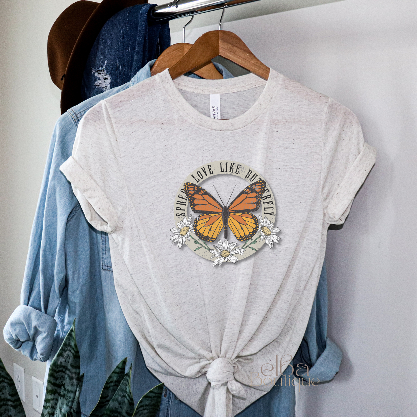 SPREAD LOVE LIKE A BUTTERFLY WOMEN'S T-SHIRT.