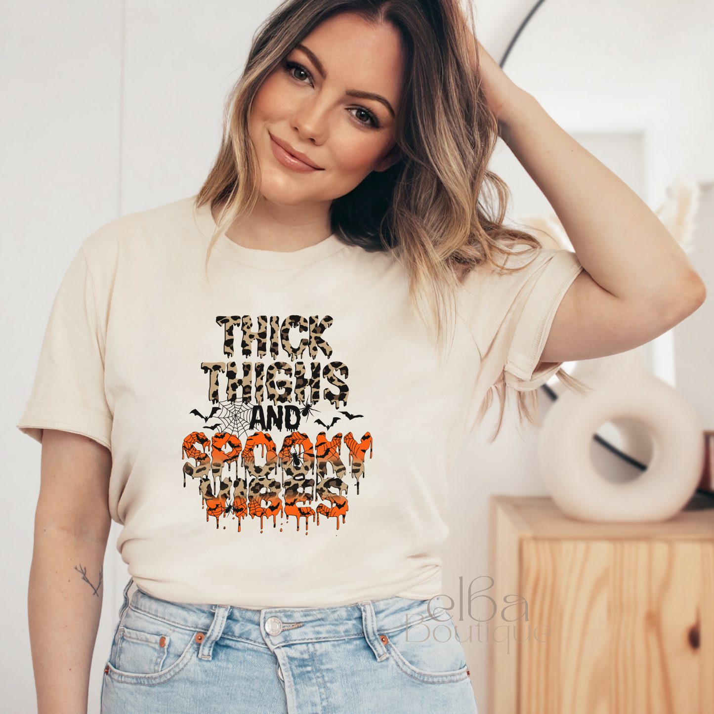 THICK THIGHS AND SPOOKY VIBES T-SHIRT